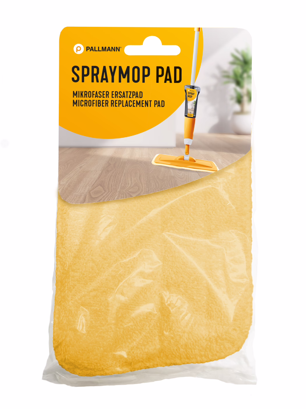 Gele microvezel vervangpad verpakt voor een spraymop van Pallmann. De oranje-witte header toont 'SPRAYMOP PAD' en een afbeelding van een oranje spraymop op een houten vloer; het gele microvezelpad is zichtbaar door het doorzichtige plastic. Heldere, schone binnenruimte met een onscherpe kamerplant op de achtergrond.